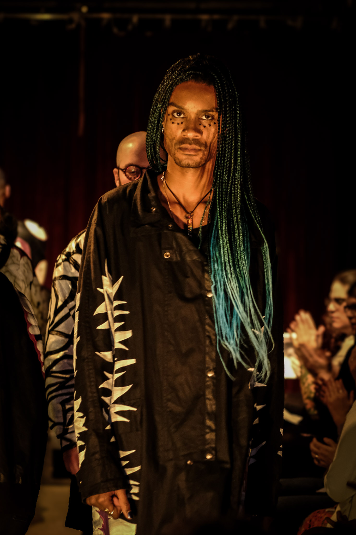 Runway presentation dark structured jacket